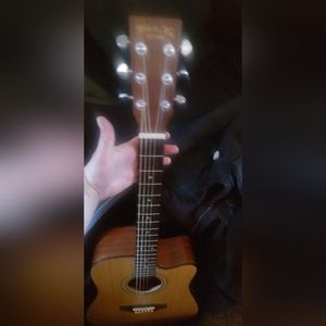 Forrest Man est. 1968, acoustic guitar.